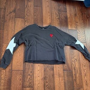 Black Women's Cropped Sweatshirt with Star Sleeves and Red Heart Detail